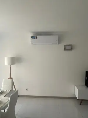 a white room with a air conditioner on the wall at Laginha Views in Mindelo