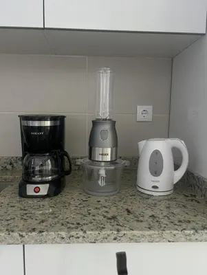 a kitchen counter with a blender and a food processor at Laginha Views in Mindelo