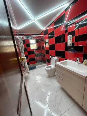 a bathroom with a toilet and a sink at La maison paisible in Malveira