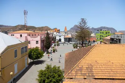 a view of a town with people walking down a street at 2 bdr cozy apartment in city center, Wifi - LCGR in Assomada