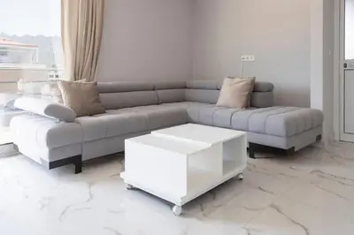 a living room with a couch and a coffee table at 2 bdr cozy apartment in city center, Wifi - LCGR in Assomada