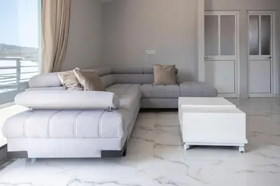 a living room with a couch and a coffee table at 2 bdr cozy apartment in city center, Wifi - LCGR in Assomada