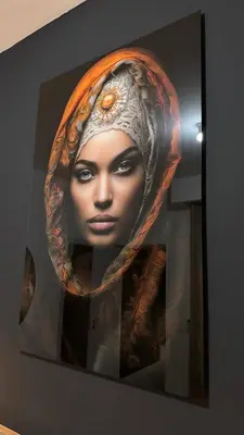 a painting of a woman wearing a head scarf at CasaZina in Tarrafal