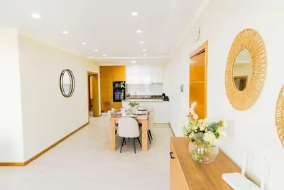 a dining room and kitchen with a table and chairs at Jet Ap & Car 23 in Praia