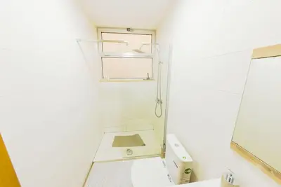 a small bathroom with a sink and a toilet at Jet Ap & Car 23 in Praia
