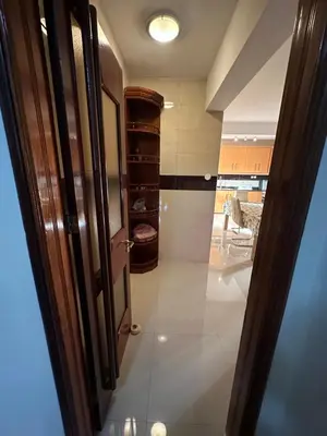 a hallway with a door leading to a room at Casa Lima in Mindelo