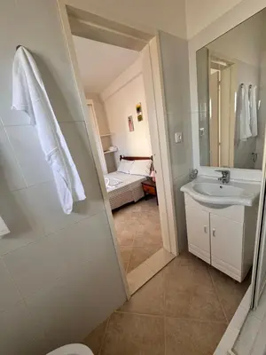 a bathroom with a sink and a mirror at Sea view - Ca Mauro - Praia Cabral - Wi-Fi in Sal Rei