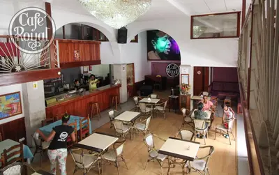 an overhead view of a restaurant with people sitting at tables at Royal Mindelo Suite in Mindelo