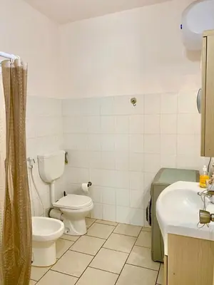 a bathroom with a toilet and a sink at Vista di mare in Sal Rei