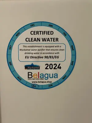 a sign that says certified clean water on a wall at FantaSea Apartment Leme Bedje in Santa Maria