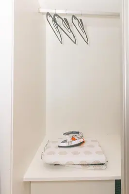 a white table with a towel on it at Brand New Spacious T3 Apartment in Santa Maria in Santa Maria
