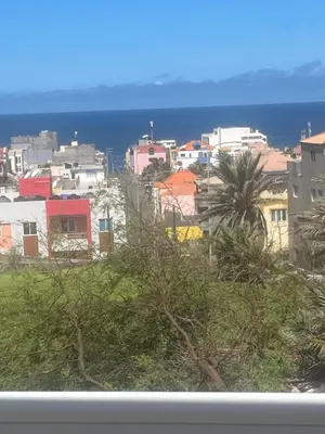 a view of a city with the ocean in the background at Casa Branca in Ponta do Sol