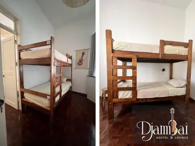 a couple of bunk beds in a room at Hostel Djambai in Mindelo
