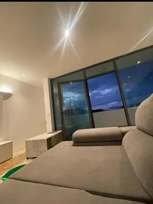 a bedroom with a bed with a view of the sky at Casa Monte Cara T2 in Lazareto