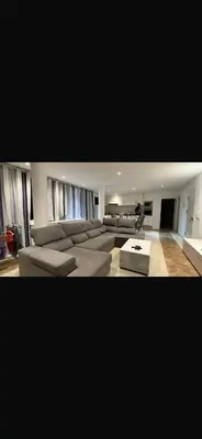 a large living room with couches and a table at Casa Monte Cara T2 in Lazareto