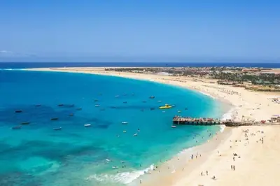 an aerial view of a beach with a group of people at La Piazza in Santa Maria