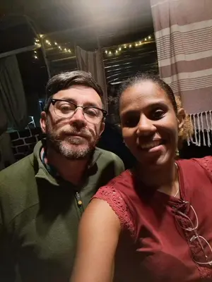 a man and a woman posing for a picture at Mendes Family Guesthouse, and Services in Praia