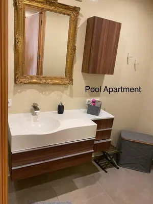 a bathroom with a sink and a mirror at Luxury Paradise Beach Lagoon in Sal Rei