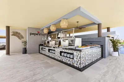 a rendering of a food counter in a restaurant at Hotel Riu Palace Santa Maria - All Inclusive in Santa Maria