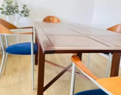 a wooden table with chairs and a wooden table at Sal Little Heart Grand Terrace Apartment 26 in Santa Maria