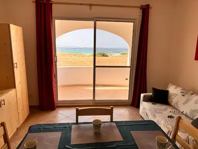 a living room with a view of the ocean at Nautilus Cabral Sea view, free Wi-Fi in Sal Rei