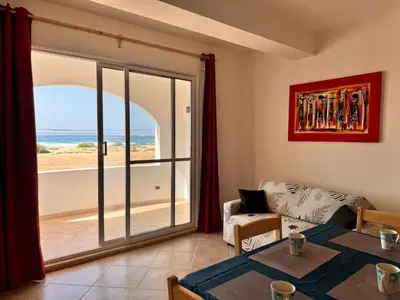 a living room with a view of the ocean at Nautilus Cabral Sea view, free Wi-Fi in Sal Rei