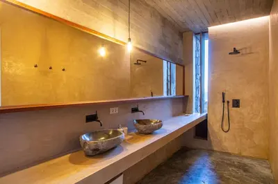 two sinks on a counter in a bathroom at Villa, Vue Mer et Piscine Privée in Mindelo