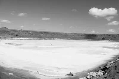 a large frozen lake with snow on top of it at Tity Apartments T2 in Santa Maria