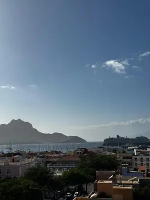 a view of a city with mountains in the background at Fanon Flat T2 in Mindelo