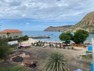 a view of a beach with boats in the water at Tarrafal Paradise Suite in Tarrafal