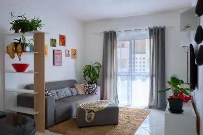 a living room with a couch and a window at Super Cozy One-Bedroom Apartment in Santa Maria