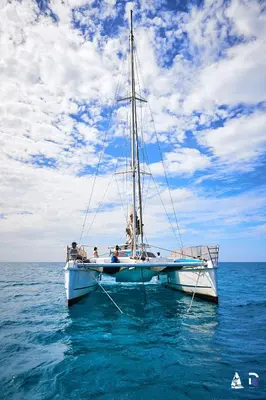 a group of people on a boat in the water at Privat Apartment with Pool View! in Santa Maria