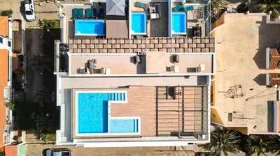 an aerial view of a house with a swimming pool at Apartamento Praia Santa Maria in Santa Maria