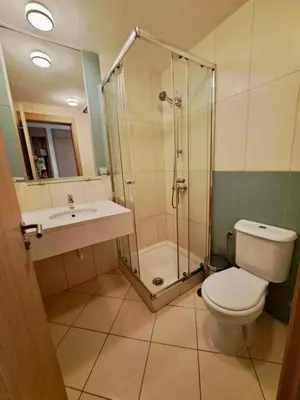 a bathroom with a shower and a toilet and a sink at 2Bed-Vila-Verde Sal Cape Verde-Balcony-Pool in Santa Maria