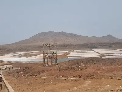 a view of a desert with a mountain in the background at 2Bed-Vila-Verde Sal Cape Verde-Balcony-Pool in Santa Maria