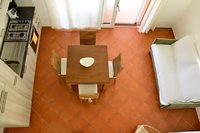 an overhead view of a table in a kitchen at Porto Antigo II Poolside Appartment in Santa Maria