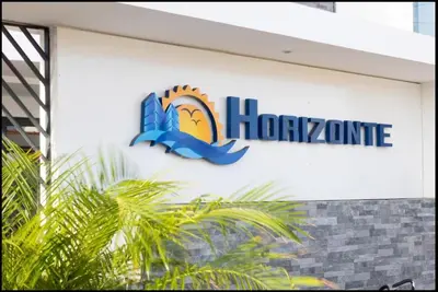 a honda sign on the side of a building at Condomínio Horizonte in Praia