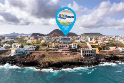 a view of a city with a blue map at Condomínio Horizonte in Praia