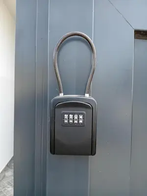 a padlock is hanging on a blue door at Tarrafal Bay - 1Bdr Apt - 3 in Tarrafal