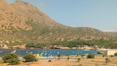 a view of a body of water with mountains in the background at Tarrafal Bay - 1Bdr Apt - Sea view - 4 in Tarrafal