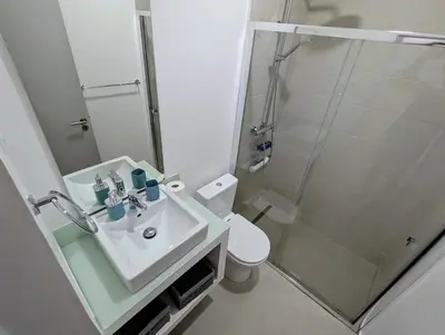 a bathroom with a sink and a shower and a toilet at Tarrafal Bay - 1Bdr Apt - Sea view - 4 in Tarrafal