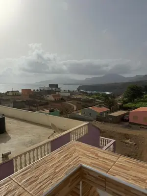 a view of a town from the balcony of a house at Casa Carveiros Panoramic 360 in Tarrafal