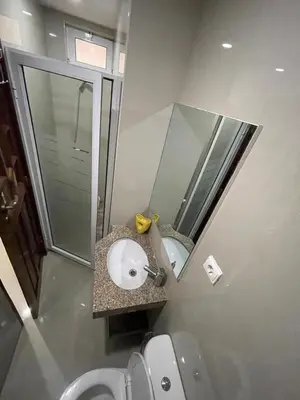 a bathroom with a sink and a mirror at Suites Home Tarrafal in Tarrafal