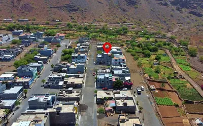 an aerial view of a city with a red stop sign at Casa Magui e Cláudio in Tarrafal
