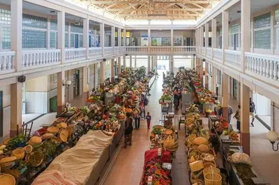 a large room filled with tables filled with food at Casa Maré & Museu - Porta Nº 18 in Mindelo