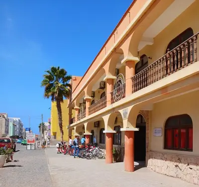 a group of motorcycles parked next to a building at Stay, laugh, repeat! in Prainha