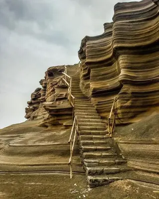 a large stack of rocks with a staircase on it at Ca Azul in Tarrafal