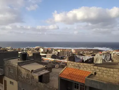 a view of a city with the ocean in the background at ApartamentoT1 Ponta do Sol in Ponta do Sol