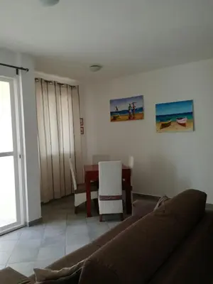 a living room with a couch and a table at Casa Sara Boavista in Sal Rei