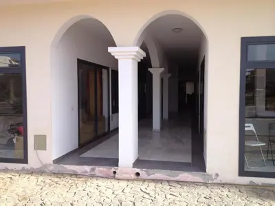 a building with arches and windows on the side at Casa Sara Boavista in Sal Rei